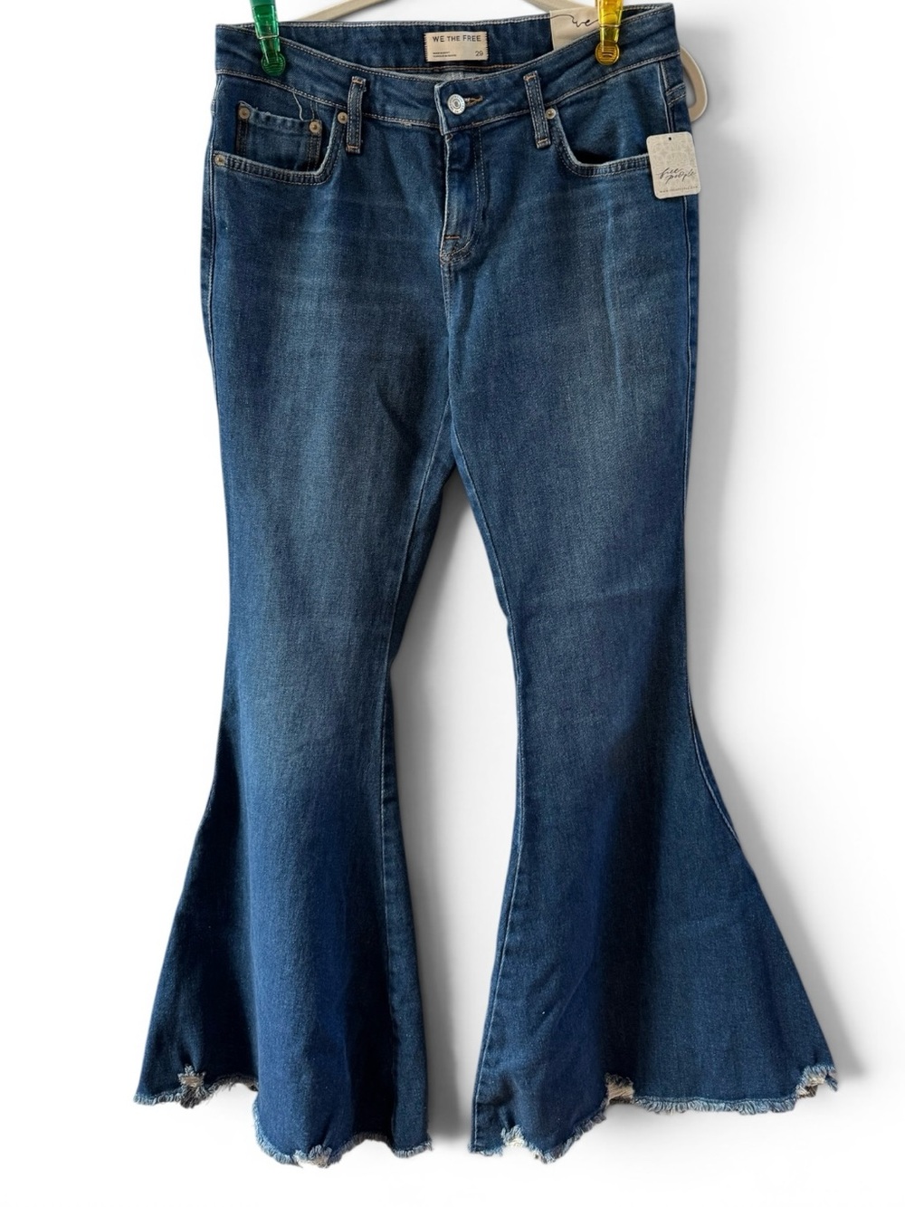 NWT We The Free Dark Blue Flare Jeans - Distressed Cuffs - Size 29/33